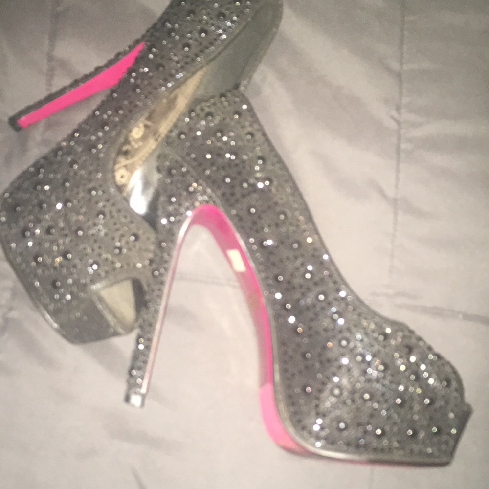 Black 9 stilettos worn bling